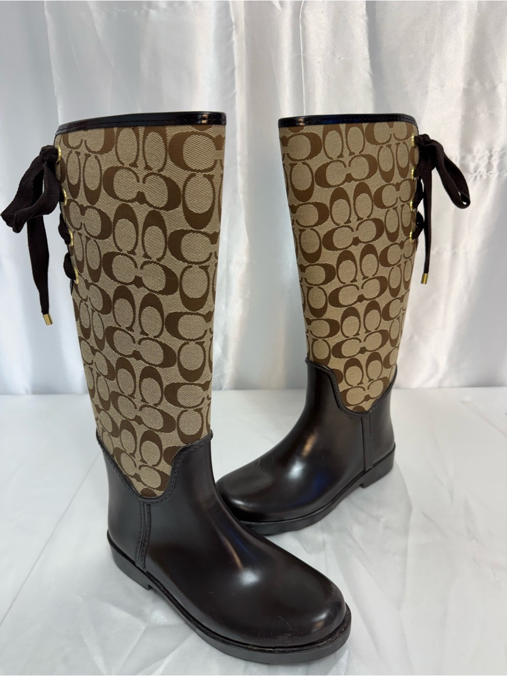 Coach Tristee Brown Signature Monogram Tall Rubber and Canvas Rain Boots